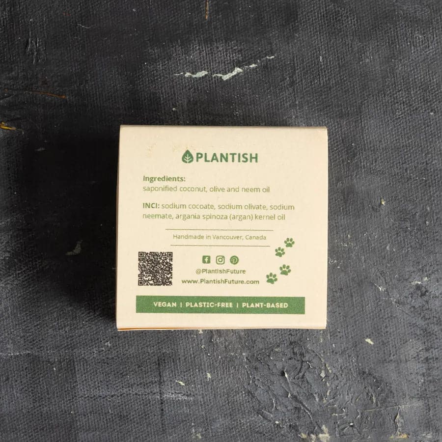 Plantish product label on a textured black background